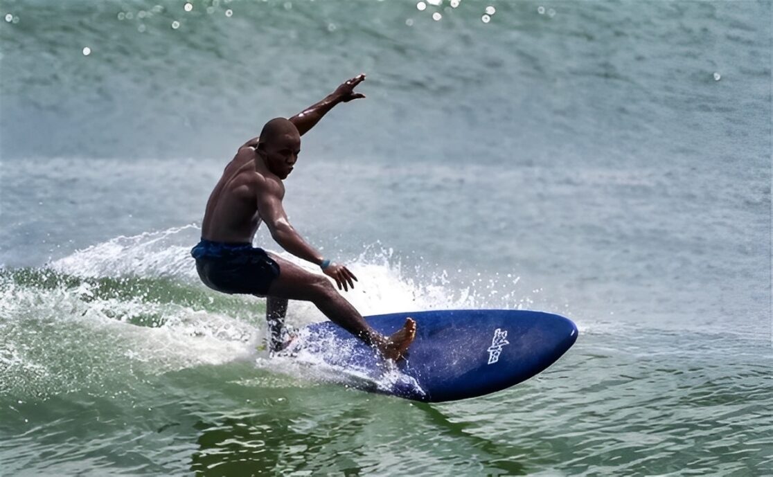 Surfer Riding Wave